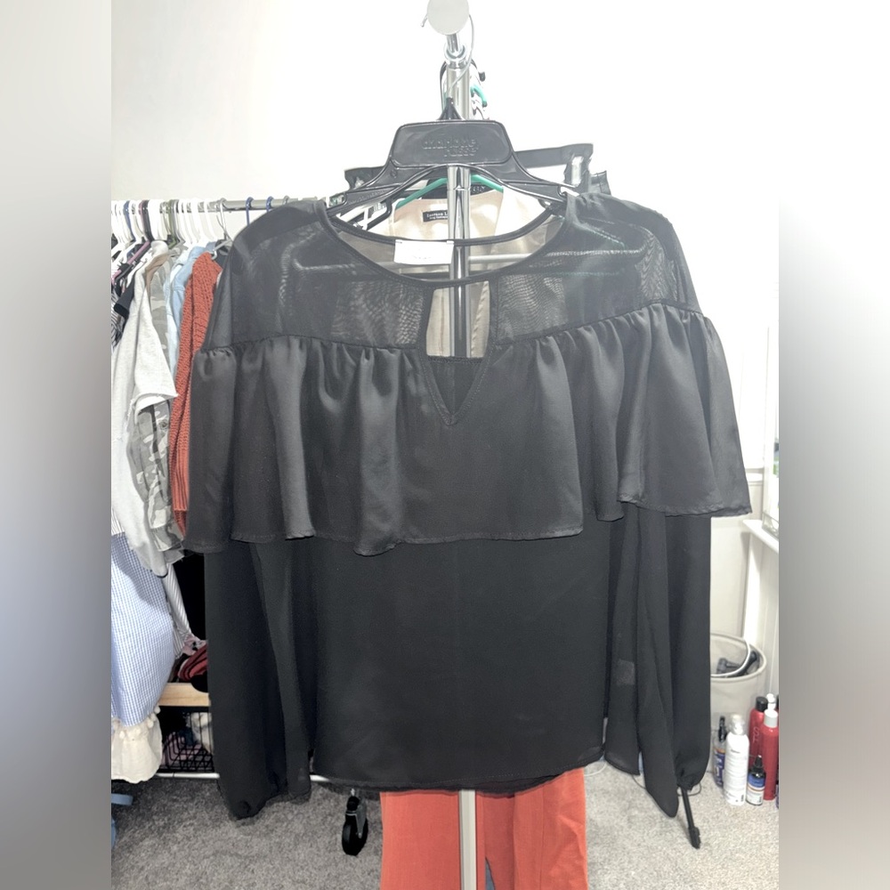 Sheer black blouse